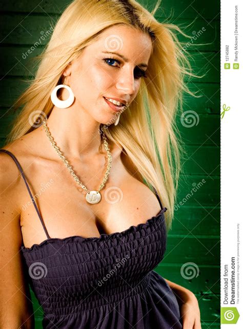 Sexy Blonde Woman Fashion Model Showing Cleavage Stock