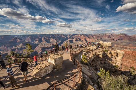 grand canyon visitor   railing loses  footing   life