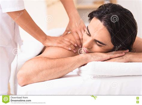 Skillful Beautician Doing Back Massage For Guy Stock Image Image Of