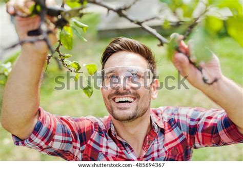young man gardening  backyardclose stock photo  shutterstock