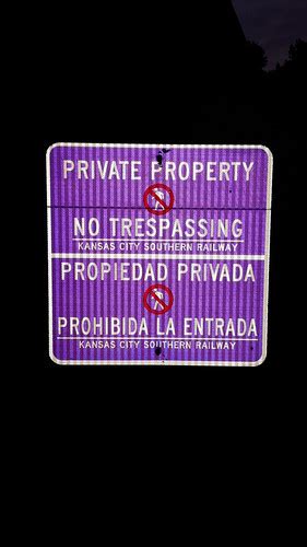 Purple No Trespassing Signs Tree And Post Markings