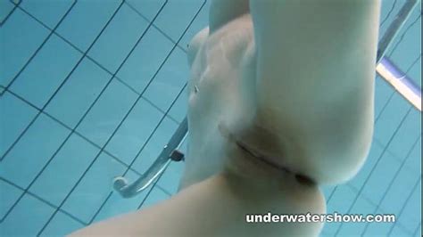 Redhead Mia Stripping Underwater