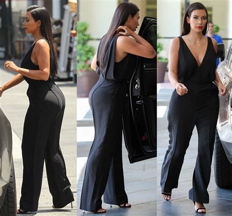 kim kardashian wearing a v neck black jumpsuit jumpsuit fashion how