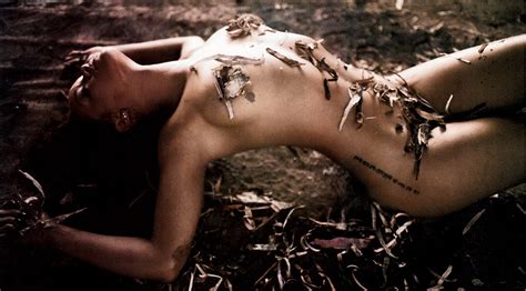 rihanna fully nude but hiding for the november 2011 issue of esquire magazine