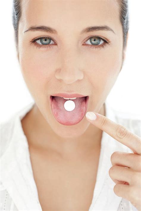 Woman Taking Medication Photograph By Ian Hooton Science Photo Library