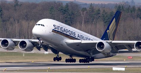 singapore airlines reduces fleet   planes