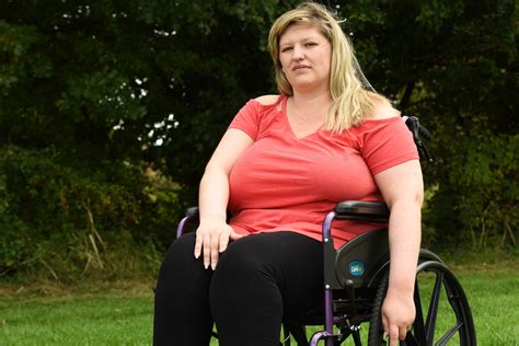woman with massive 42i breasts left wheel chair bound