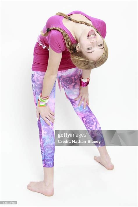 teenage girl bending over backwards photo getty images