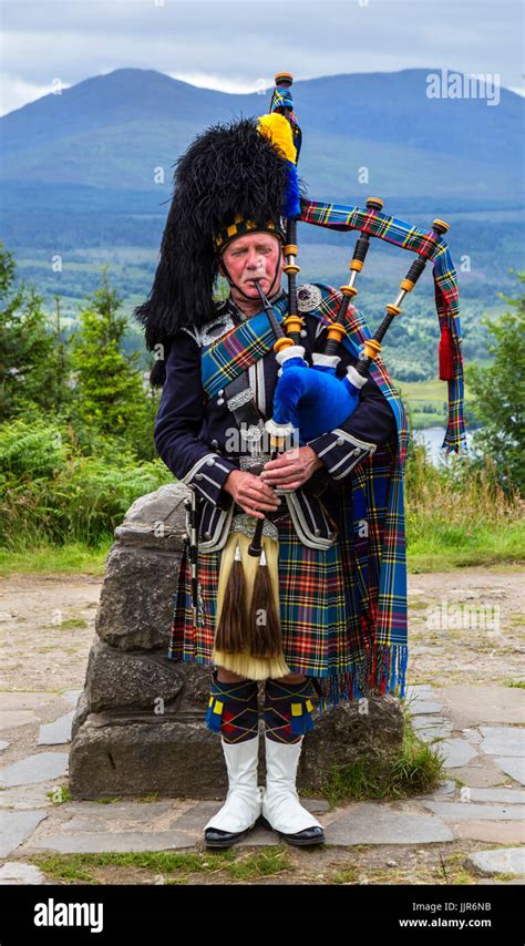 scottish piper high resolution stock photography  images alamy