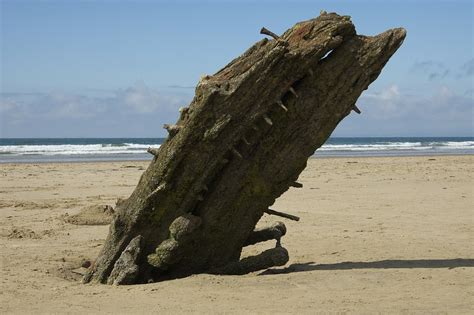 shipwreck beach sand  photo  pixabay