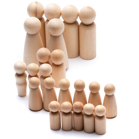 assorted unfinished wood peg doll bodies wooden doll heads and bodies
