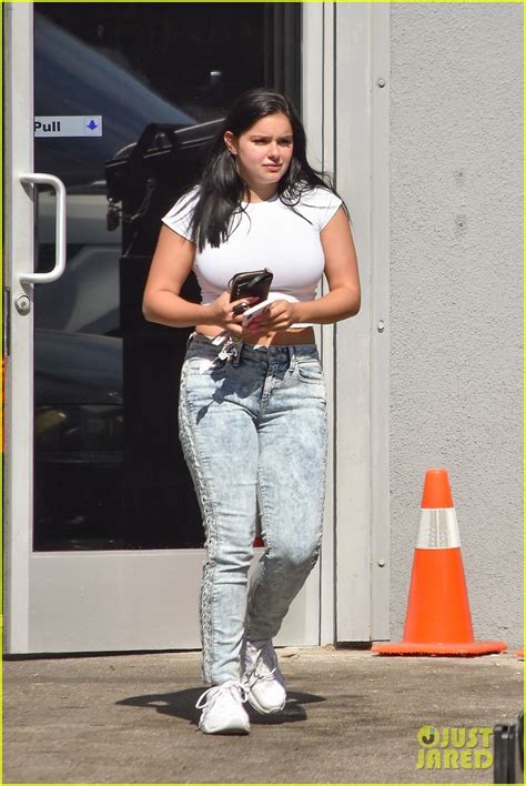photo ariel winter bares her midriff in white crop top during errand
