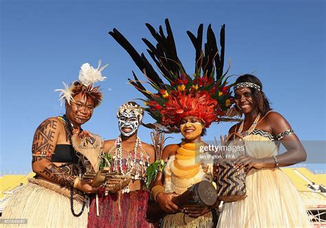 papua new guineans in traditional dress pose for photo s