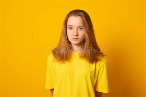 teenager in yellow bikini taking a shower stock image