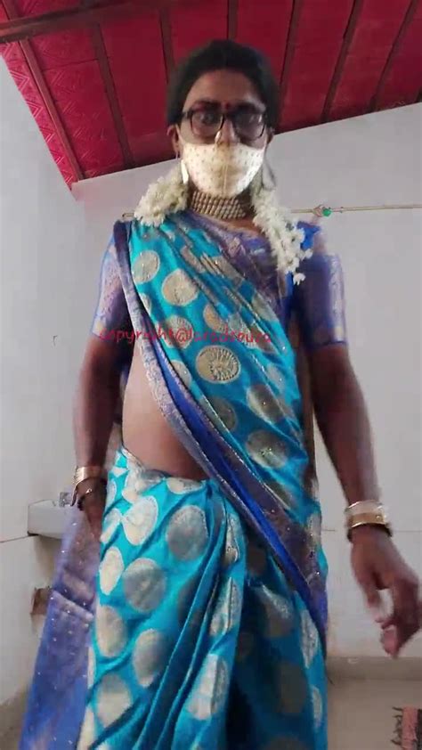 indian beautiful crossdresser model in blue saree