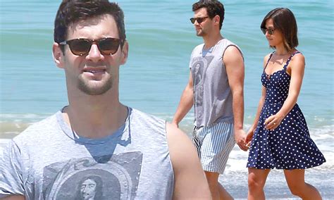 justin bartha slips away from party to hold hands with fiancee lia