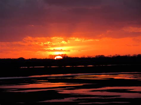 zonsondergang aan het water de veluwenaar