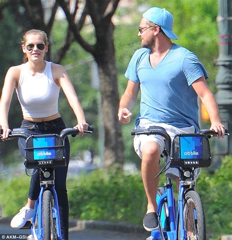 leonardo dicaprio takes a bike ride with mystery blonde in new york after rumors he was