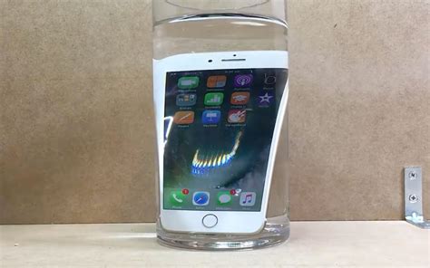 iphone  waterproof tests submerged  water hot coffee     unscathed tomac