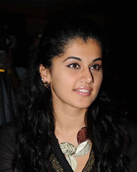 taapsee pannu smiling photos in maroon dress tollywood stars