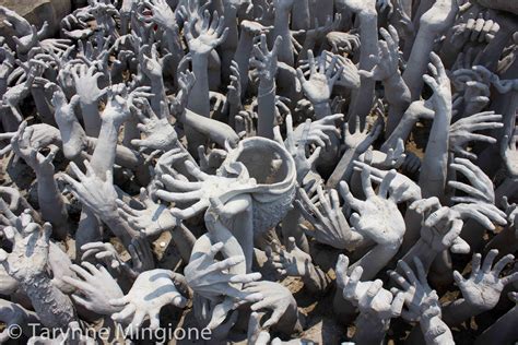 outstretched hands  wat rong khun  white temple  chiang rai