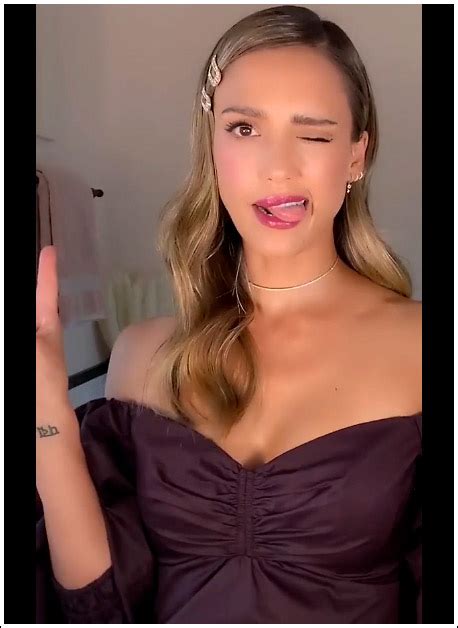 popoholic blog archive jessica alba gives us a flirty and cleavagy