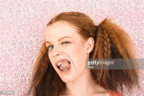 Portrait Of Teenage Girl 16 17 Sticking Tongue Out Bildbanksfoton Och