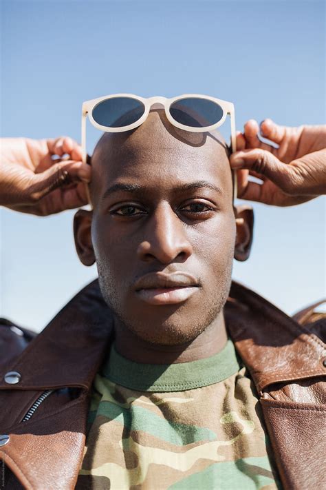 Portrait Of A Cool Black Man With Sunglasses By A Model Photographer