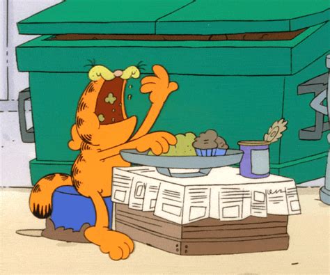 dinner eating gif  garfield find share  giphy