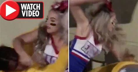 teen cheerleader in uniform body slams larger bully after