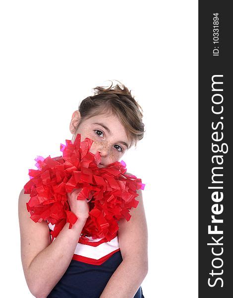girl with freckled face and cheerleader pompom free stock images