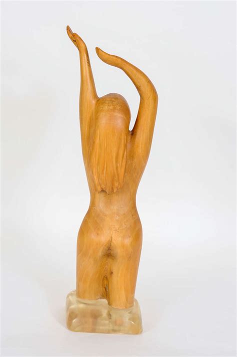 Wooden Statue Of A Naked Woman Standing In Water By Dutch