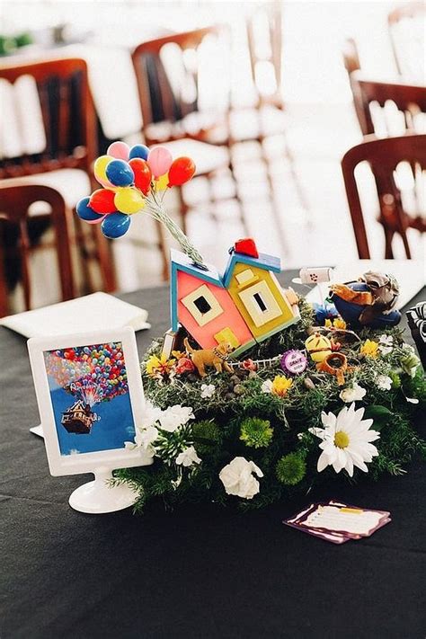 up disney loving couples will melt over these magical wedding centerpieces popsugar home