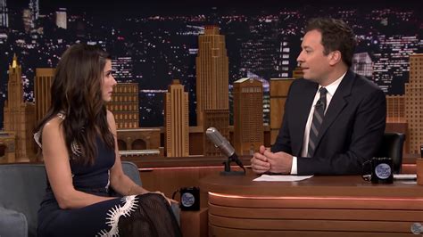 Watch Jimmy Fallon And Sandra Bullock Use Fake Arms To Cover Each Other