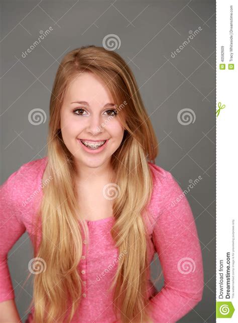 headshot of smiling teen girl with braces stock image image of orthodontist feminine 40582609