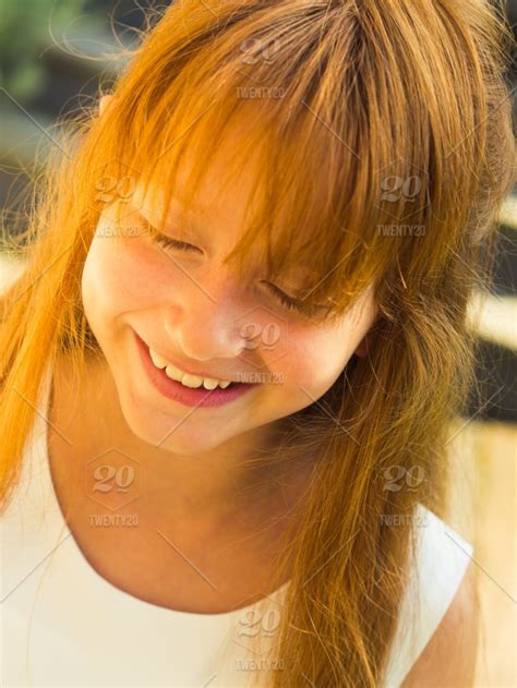 Closeup Of Cute Smiling Redhead Girl In White Bridesmaid