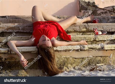 dead woman  red dress   stairs stock photo  shutterstock
