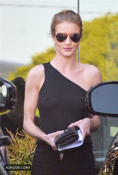 rosie huntington whiteley braless in a black outfit in