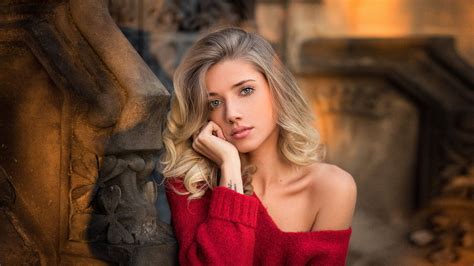 women blonde face portrait tattoo depth of field red sweater