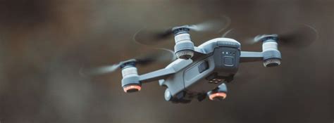 grey quadcopter drone flying facebook cover photo