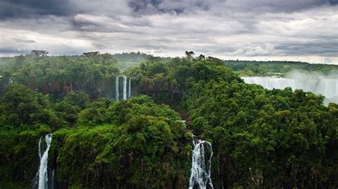 beautiful scenery waterfalls green trees bushes  black white clouds sky hd bing wallpapers