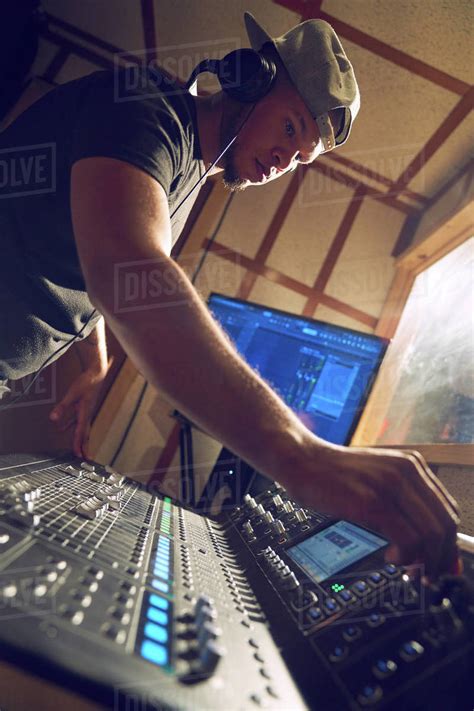 male  producer  sound board  recording studio stock photo dissolve