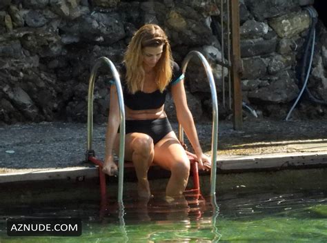 cristina chiabotto taking a bath in the sea early in the