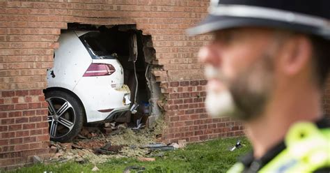 dramatic pictures show car which slammed into house and