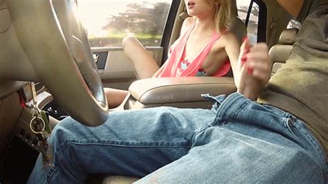handjob driving car clothed sex