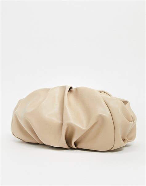 asos design oversized ruched clutch bag  beige asos