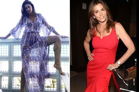 cindy crawford flashes her leg in a see through kaftan on holiday in