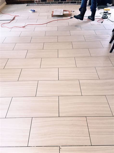 direction   run  tile flooring  patterned