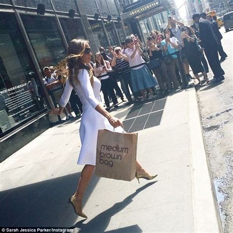 sarah jessica parker almost has a wardrobe malfunction during rooftop photoshoot daily mail online
