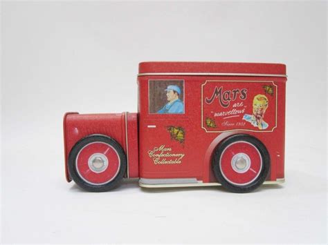 red toy truck   word mars   side   image   woman